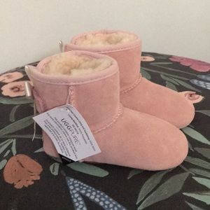 Never worn, new with tags baby girl Uggs